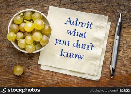 Admit what you do not know advice. Admit what you do not know advice - handwriting on a napkin with grapes