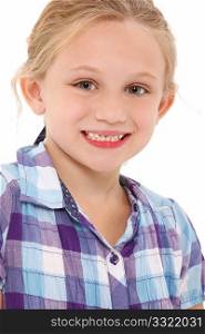Adorable  7 year old blond american girl close up head shot over white background smiling.
