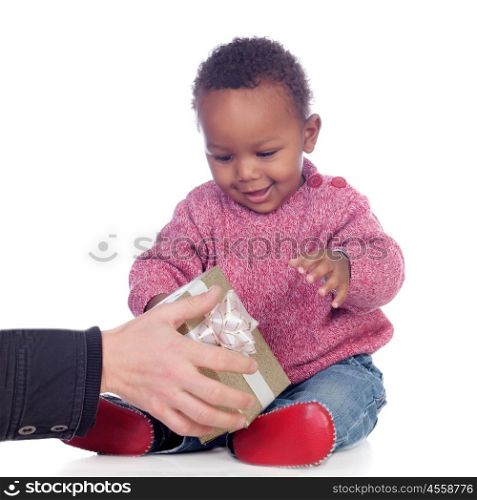 Adorable African American child playing with a gift box isolated on a white background