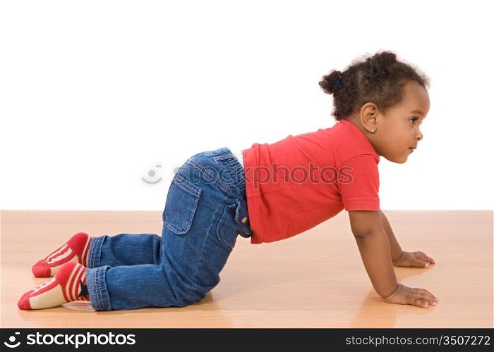 Adorable african baby crawl over wooden floor