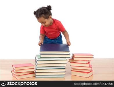 Adorable african baby ordering many books on a white background