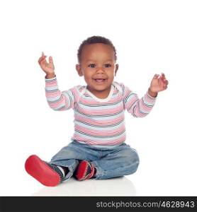 Adorable african baby sitting on the floor isolated on a white background