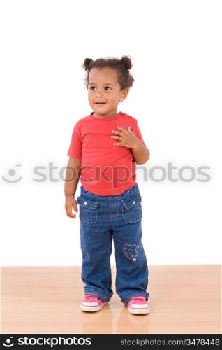 Adorable african baby standing over wooden floor
