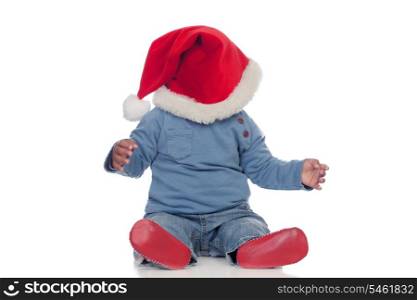 Adorable african baby with Christmas hat covering his face isolated on a white background