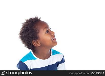 Adorable afroamerican child looking up isolated on a white background