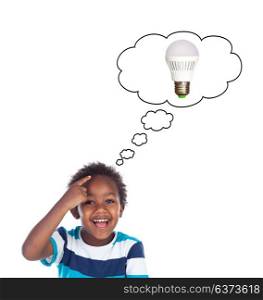 Adorable afroamerican child thinking in a light bulb isolated on a white background