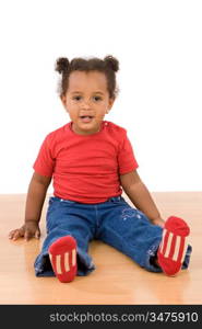 Adorable and beautiful african baby a over wooden floor