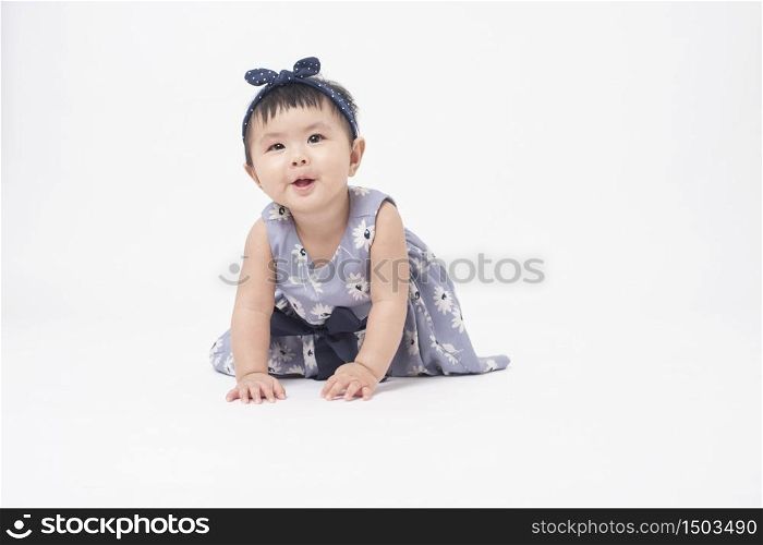 Adorable Asian baby girl is portrait on white background