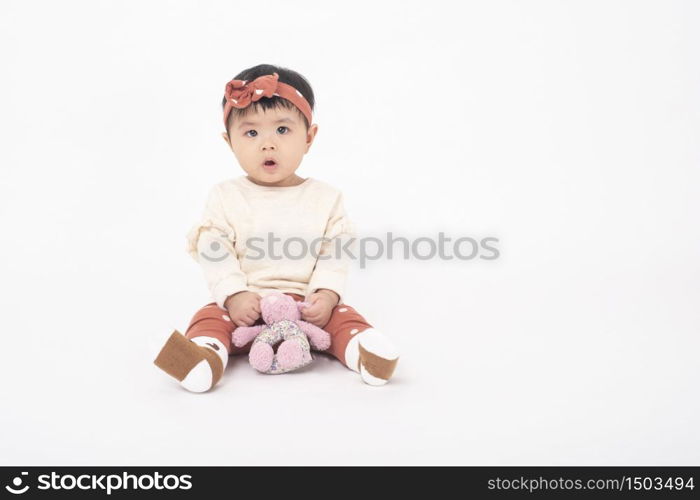 Adorable Asian baby girl is portrait on white background