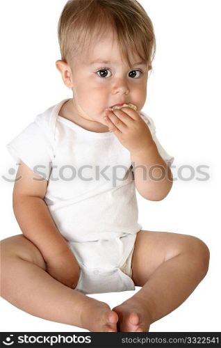 Adorable baby boy eating sandwich