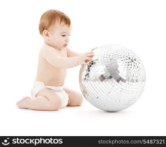 adorable baby boy with big disco ball over white