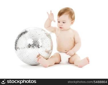 adorable baby boy with big disco ball over white