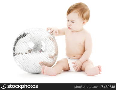 adorable baby boy with big disco ball over white