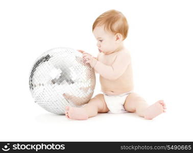 adorable baby boy with big disco ball over white