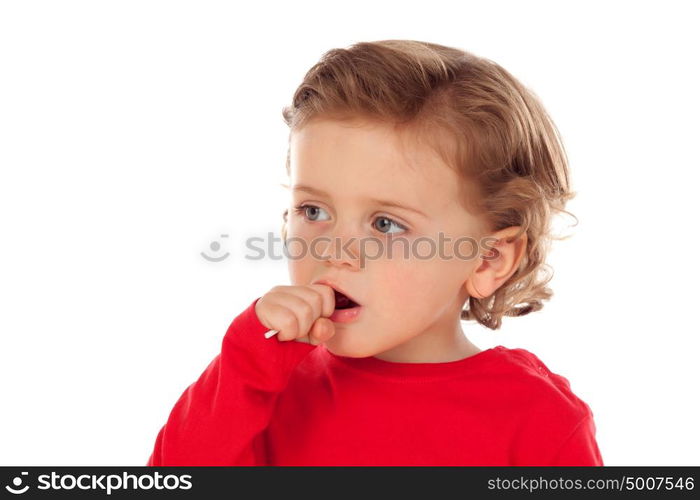 Adorable baby eating a lollipop isolated on a white background