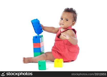 Adorable baby girl playing with building blocks