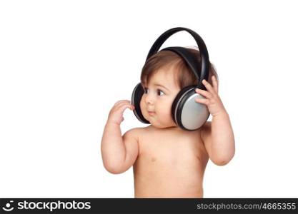 Adorable baby girl with big headphones isolated on white background