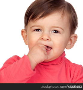 Adorable baby girl with her hand in mouth isolated on white background