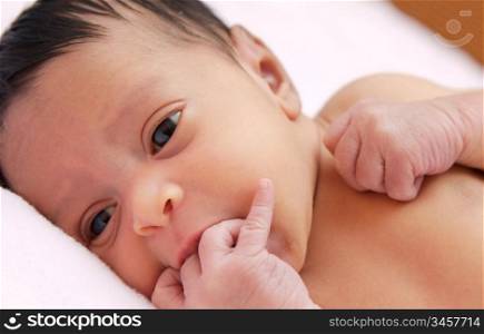 Adorable baby newborn a over pink background