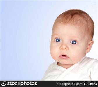 Adorable baby newborn isolated on a over blue background