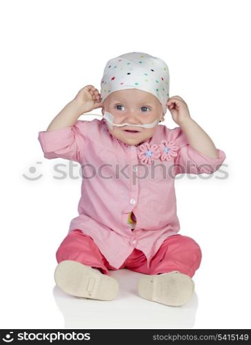 Adorable baby with a headscarf beating the disease