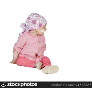 Adorable baby with a headscarf beating the disease isolated on white background