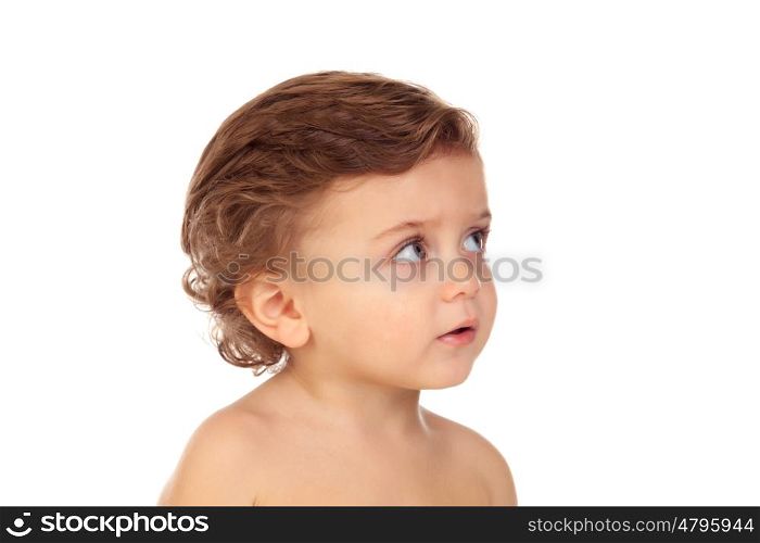 Adorable baby with blue eyes looking up isolated on a white background