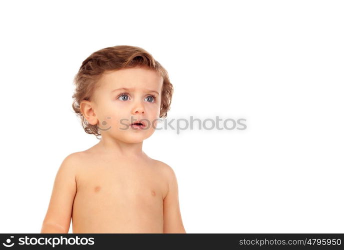 Adorable baby with blue eyes looking up isolated on a white background