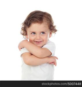 Adorable baby with curly hair playing to hugging isolated on a white background