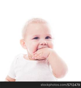 Adorable baby with finger in the mouth