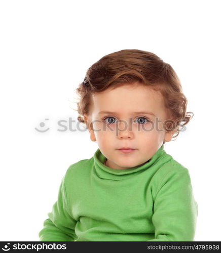 Adorable baby with green shirt isolated on a white background