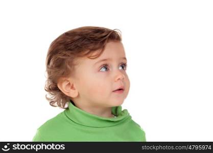 Adorable baby with green shirt isolated on a white background