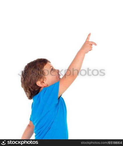 Adorable baby with red shirt pointing with his finger. Adorable baby with red shirt pointing with his finger isolated on a white background