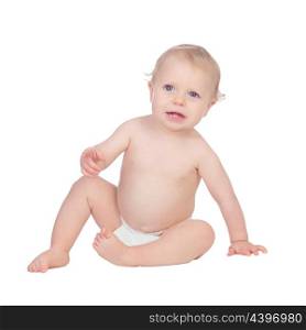 Adorable blond baby in diaper sitting on the floor isolated on a white background