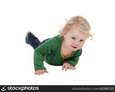 Adorable blond baby lying on the floor isolated on a white background
