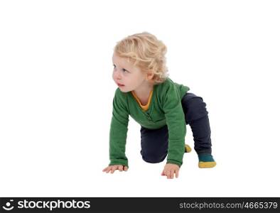 Adorable blond baby standing up isolated on a white background