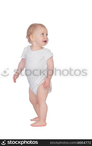 Adorable blonde baby in underwear looking up isolated on a white background