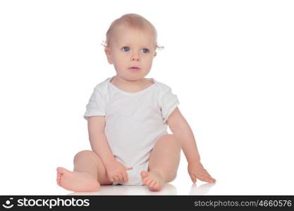 Adorable blonde baby in underwear sitting on the floor isolated on a white background