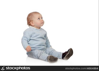 Adorable blonde baby sit on the floor isolated on a white background