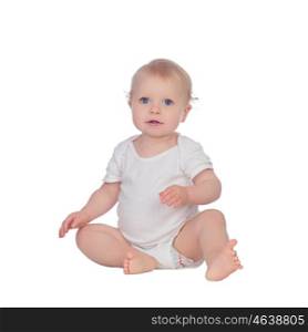 Adorable blonde baby sitting on the floor isolated on a white background