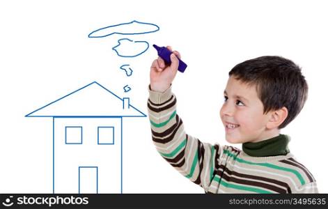 Adorable boy drawing a house on a over white background