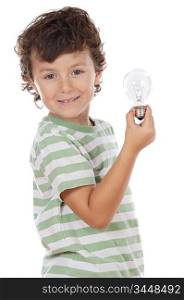 Adorable boy holding a light bulb over white background
