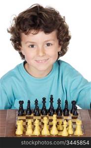 adorable boy playing the chess a over white background