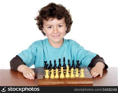 adorable boy playing the chess a over white background