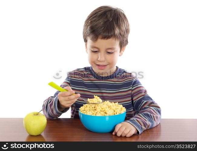 Adorable child breakfasting a over white background