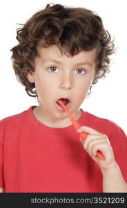 adorable child cleaning the teeth a over white background