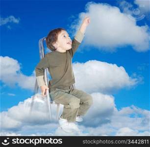 adorable child over clouds making reality its dreams
