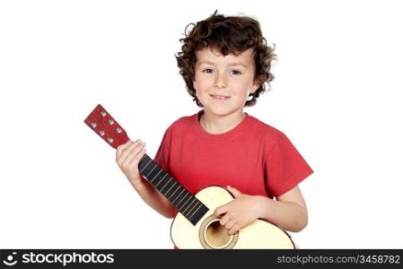 Adorable child playing guitar a over white background