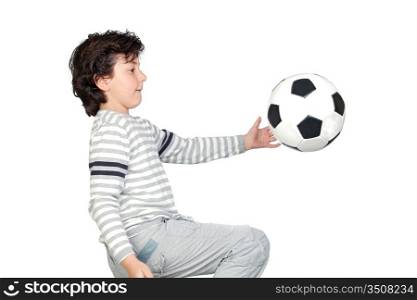 Adorable child playing with a soccer ball isolated on white background