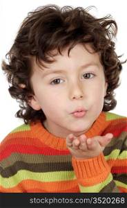 adorable child sending a kiss a over white background